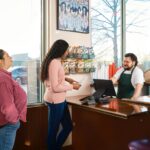 customer service interaction at restaurant counter